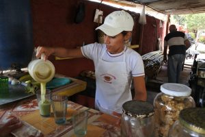 Cuban Drink Guarapo on Wilderness Voyageurs Bike Tour